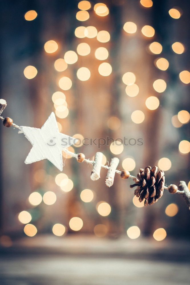 Similar – Image, Stock Photo Christmas decoration with fir cones and lights on a smooth surface with Bokeh