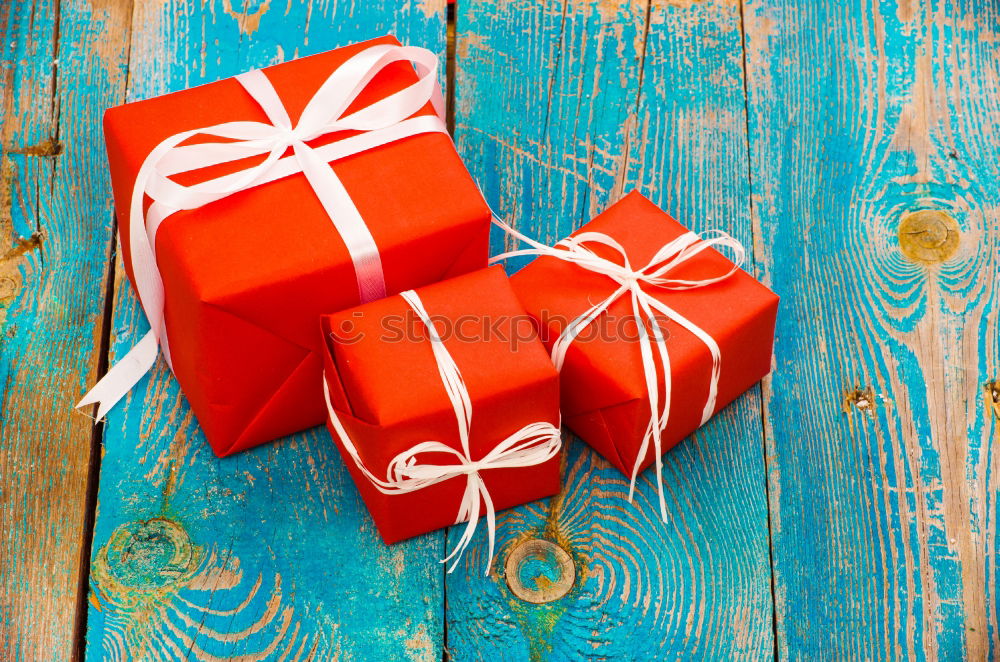 Similar – Image, Stock Photo Red wrapped gift boxes