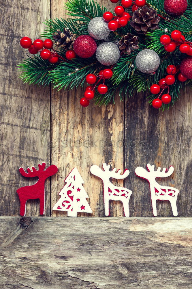 Similar – Christmas decorations over a swing in a park