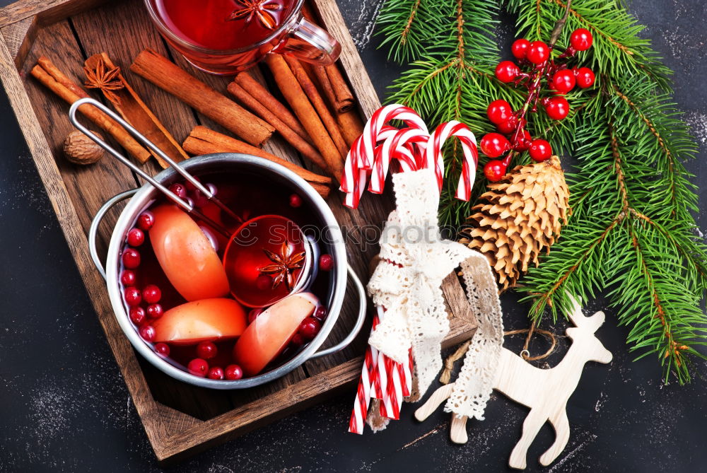 Similar – Gingerbread man with mulled wine, Christmas decoration and cookies