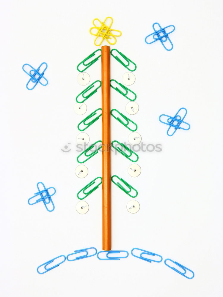 Similar – Weihnachtsbaum aus grünen Büroklammern