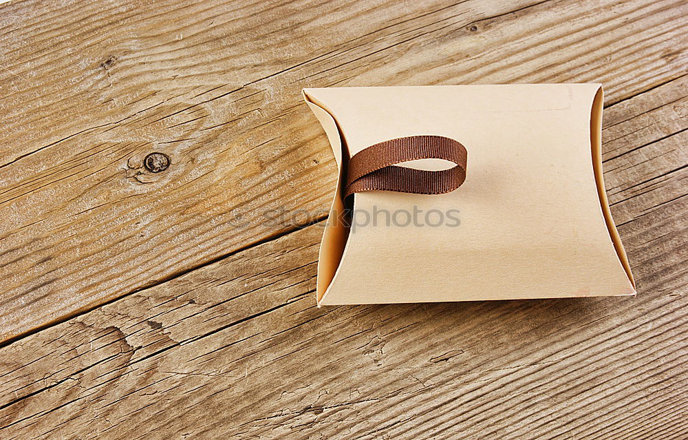 Similar – Handmade paper diary in brown leather cover over vintage wood