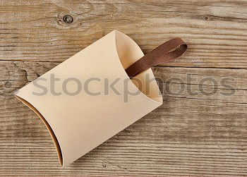 Similar – Handmade paper diary in brown leather cover over vintage wood