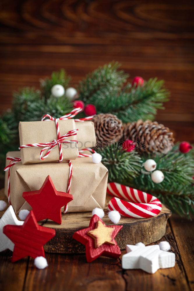 Similar – Foto Bild Papiertüte mit hölzernem Tannenbaum-Anhänger vor dunklem Hintergrund