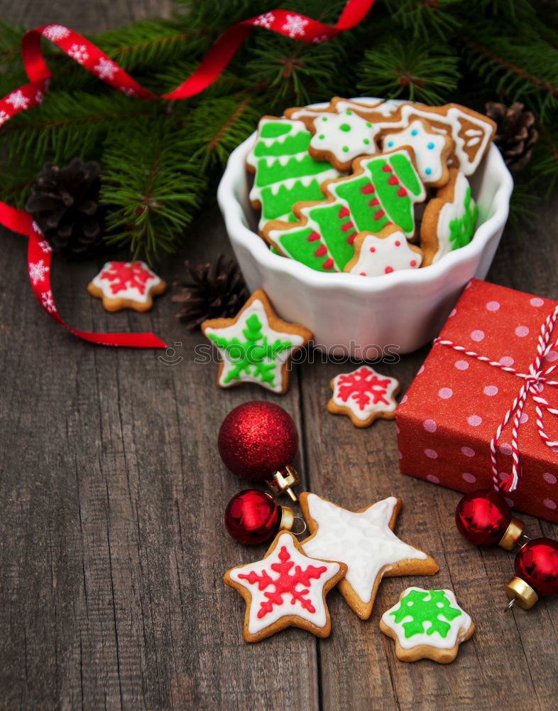 Similar – Image, Stock Photo Santa hat and decoration on a dark wooden table