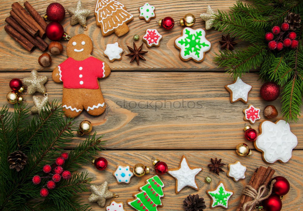 Similar – Gingerbread man with mulled wine, Christmas decoration and cookies