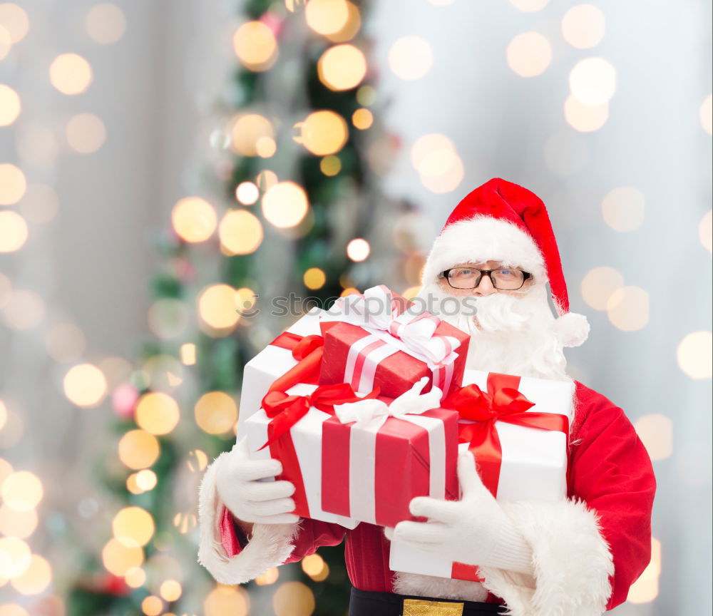 Similar – Young man holding a christmas gift