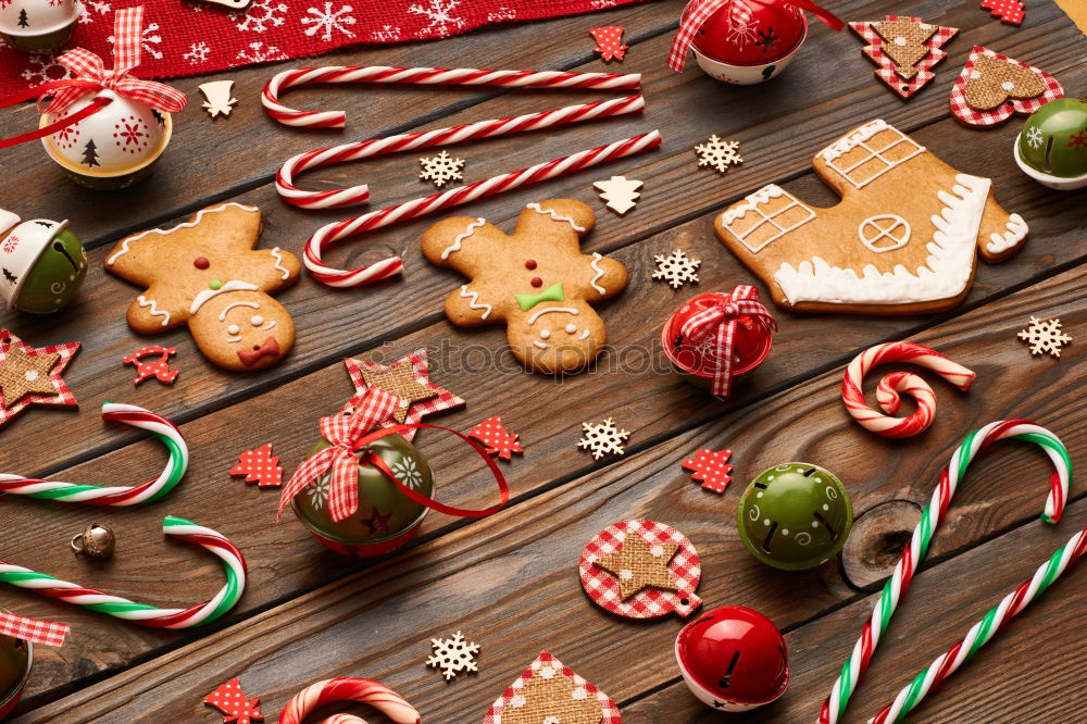 Similar – Image, Stock Photo Santa hat and decoration on a dark wooden table