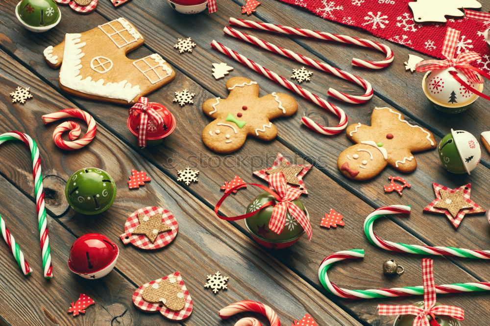 Similar – Image, Stock Photo Santa hat and decoration on a dark wooden table