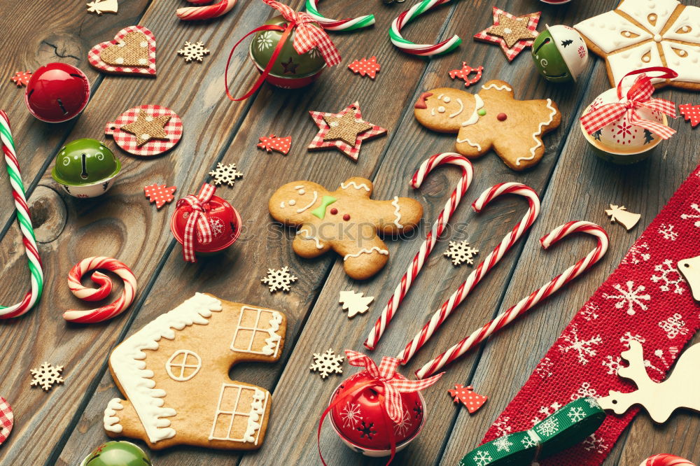 Similar – Image, Stock Photo Santa hat and decoration on a dark wooden table