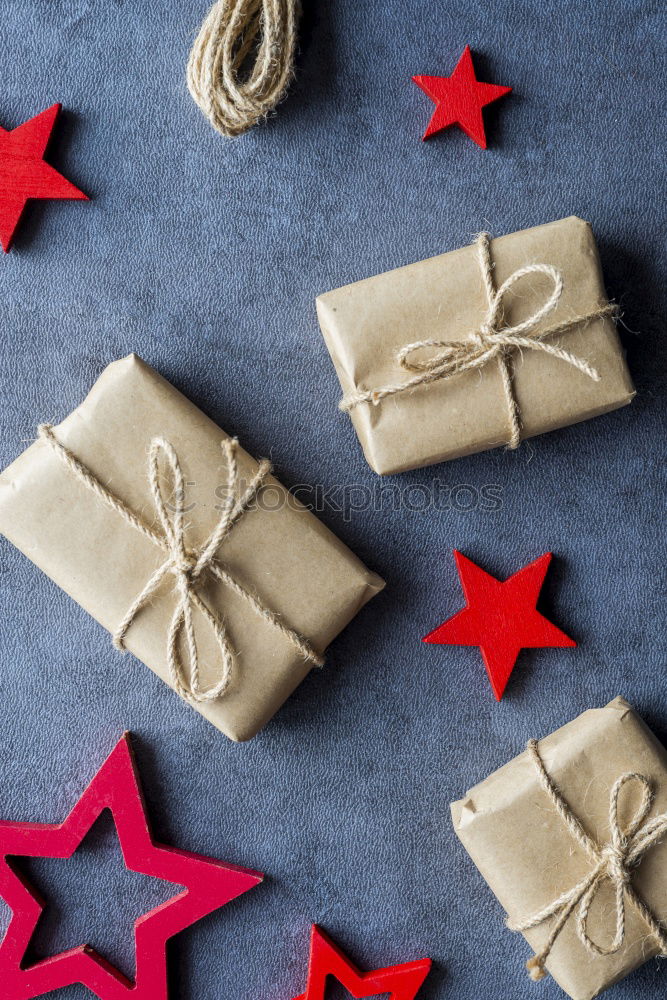 Similar – Some christmas presents in decorative boxes on a dark background