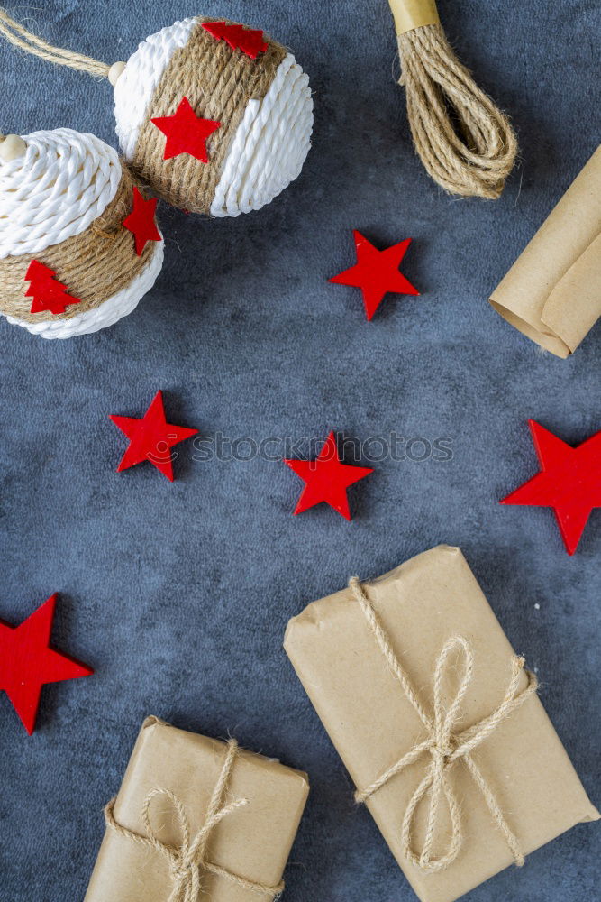 Some christmas presents in decorative boxes on a dark background