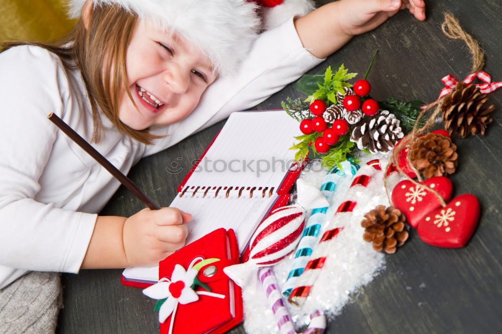 Similar – Mother and son decorating Christmas biscuits at home