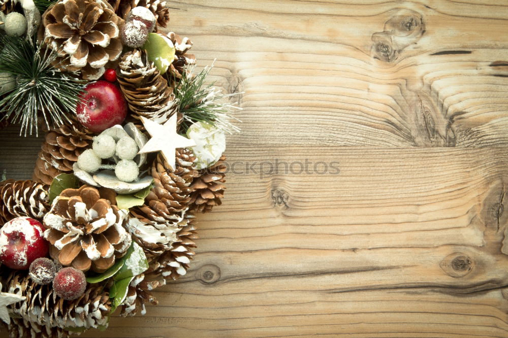 Similar – Image, Stock Photo Delicate Christmas wreath of pine cones on wooden background