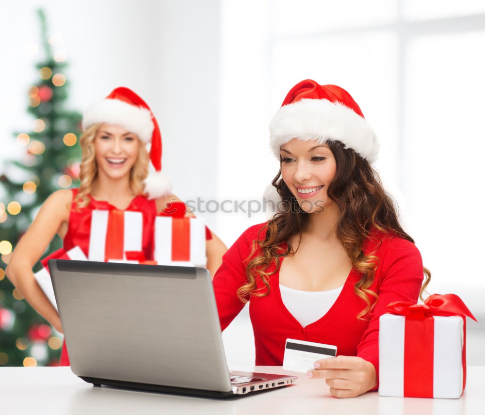 Similar – A happy couple with a child is celebrating Christmas with their friends on video call using webcam. Family greeting their relatives on Christmas eve online. New normal