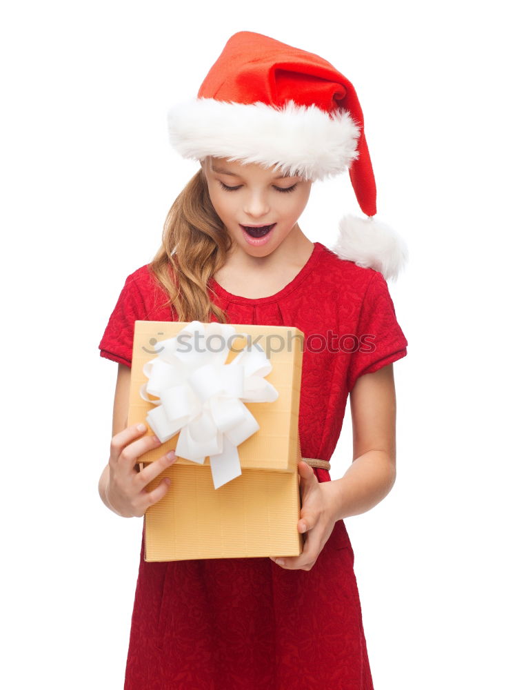 Similar – Adorable kid with Santa´s hat on Christmas day.