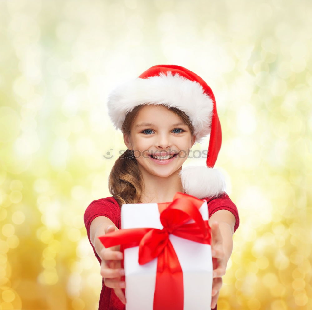 Similar – Adorable kid with Santa´s hat on Christmas day.