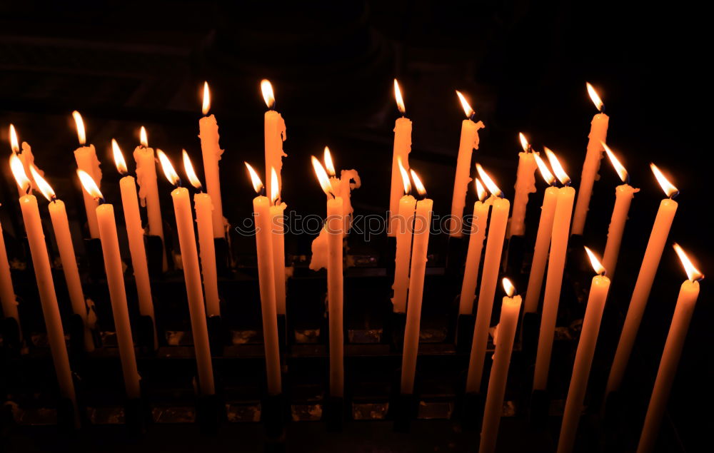 Similar – Lit beeswax candles in sand; Orthodox church