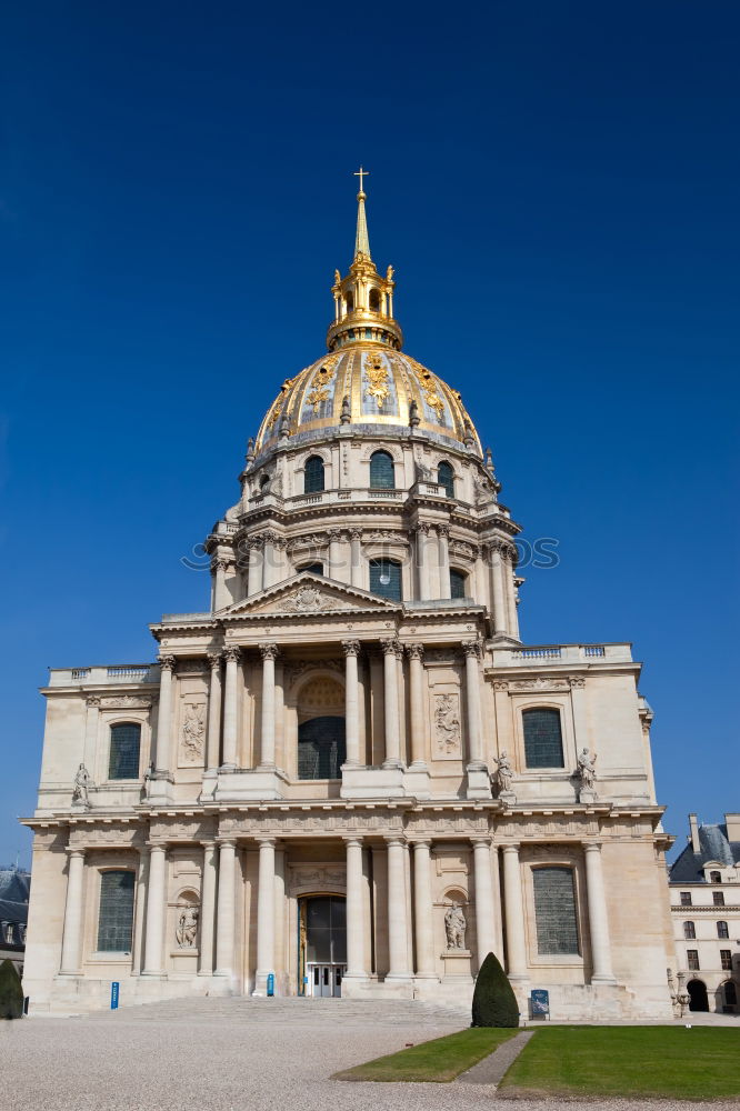 Top of the Invalides Cathedral against blue sky