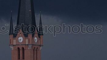 Similar – Church tower with layered clouds