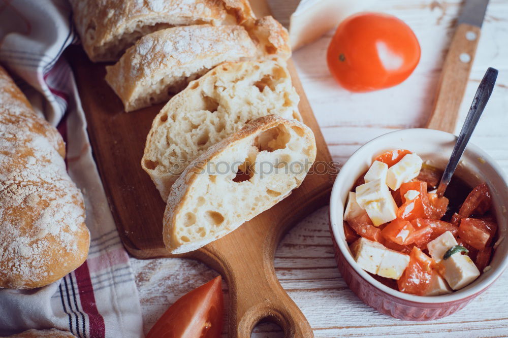 Similar – Image, Stock Photo Baguette with olives, garlic and cheese