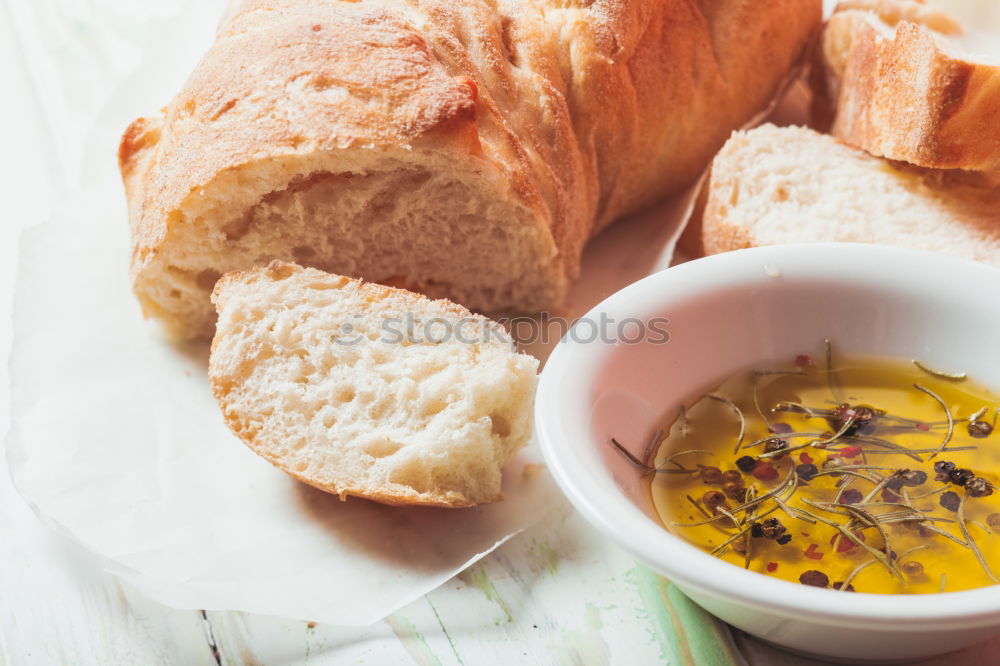 Similar – Image, Stock Photo Baguette with olives, garlic and cheese