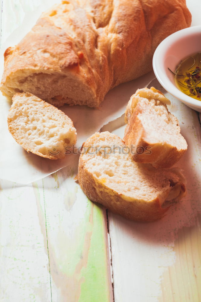 Similar – Image, Stock Photo Baguette with olives, garlic and cheese