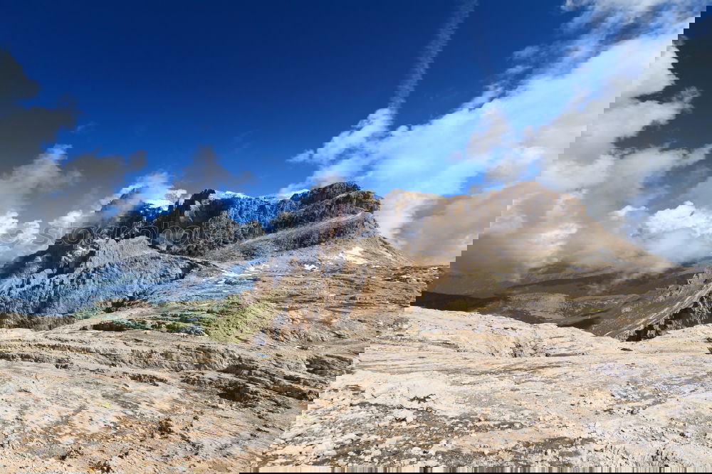 Similar – Image, Stock Photo View between two rock crevices to the next mountains in the Dolomites
