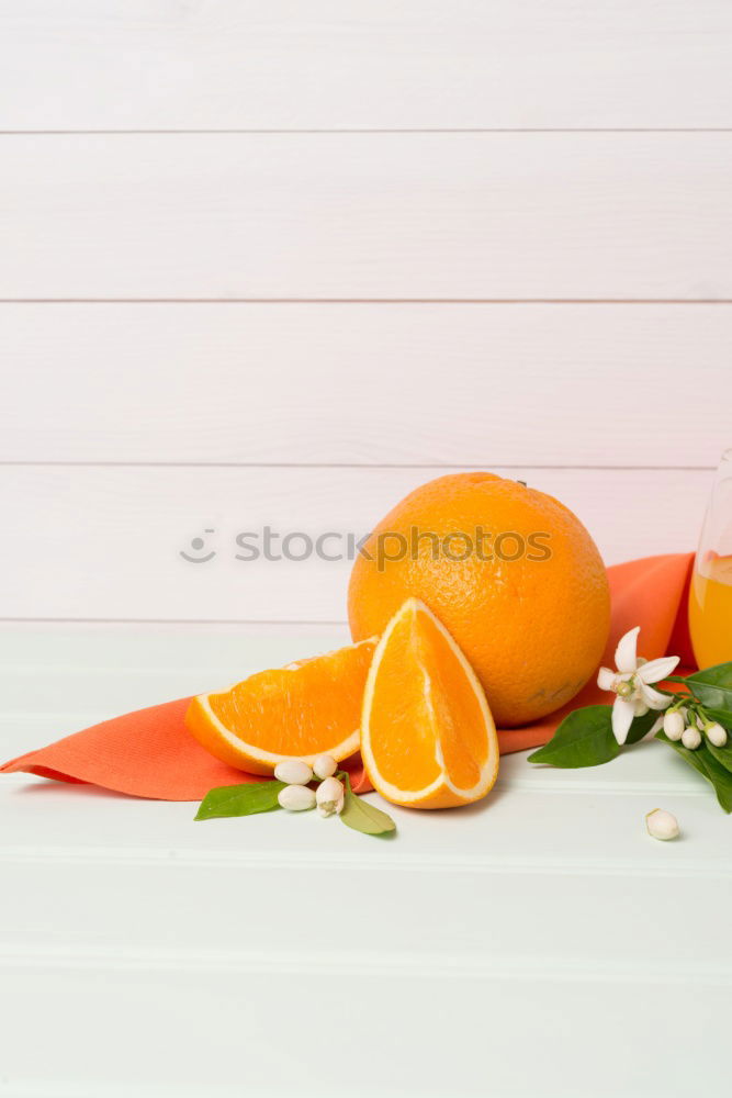 Similar – Image, Stock Photo Tangerines with green leaves in the blue bowl