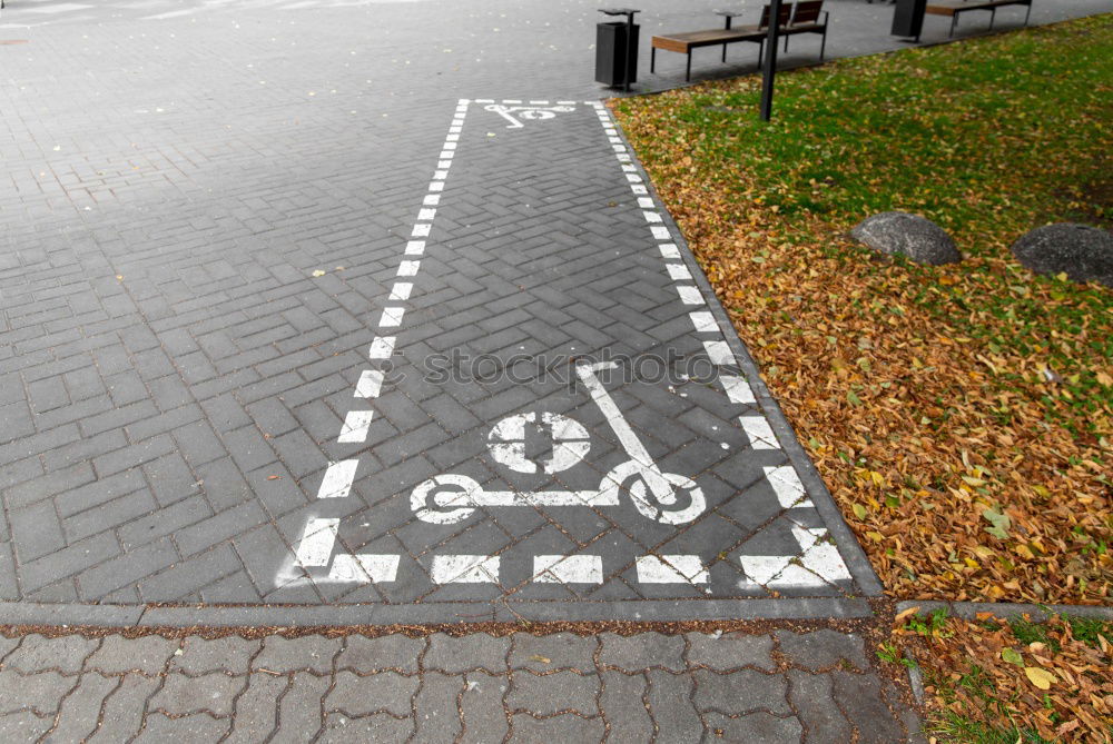 Similar – bike lane Asphalt Sidewalk