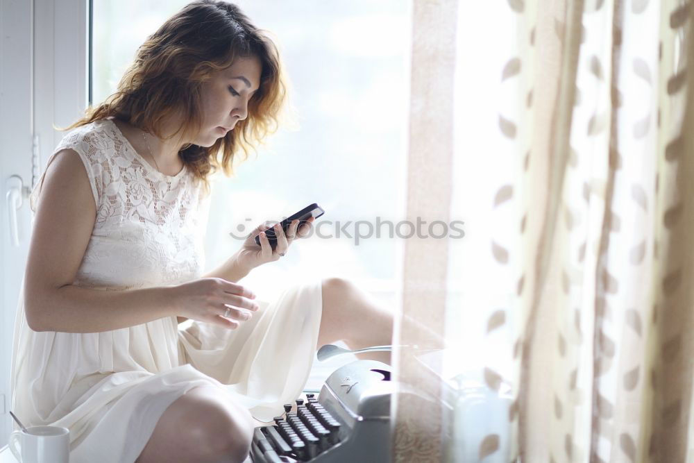 Similar – woman on bed enjoying a cup of coffee. morning