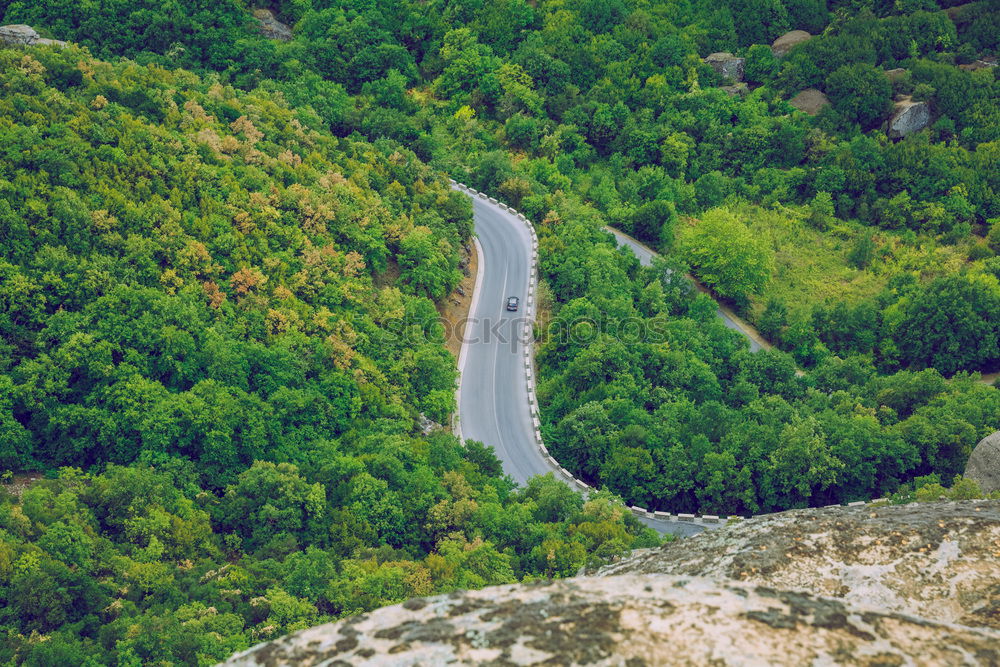 Similar – Image, Stock Photo Aerial top view top view of the road through the trees,