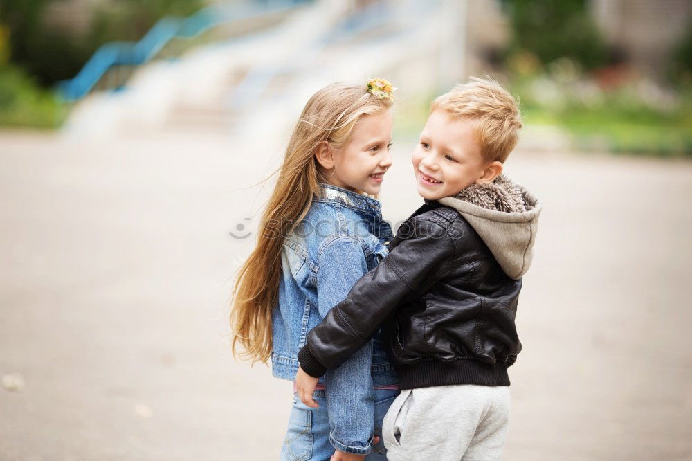 Similar – happy brothers sitting in the park