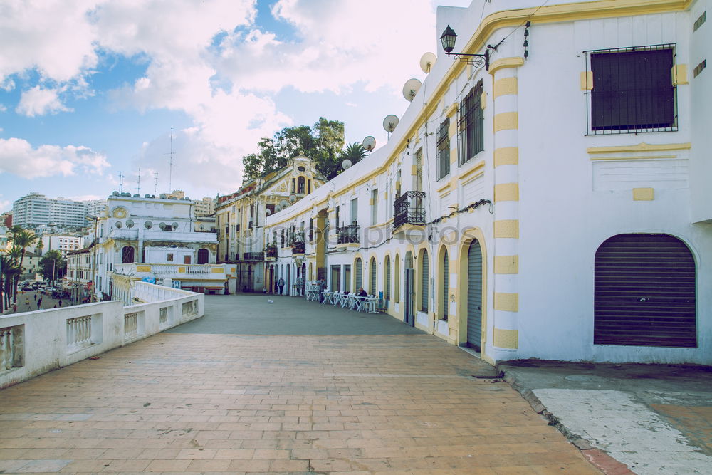 Similar – Image, Stock Photo pretty colorful alleyway in Havana with view to the harbour