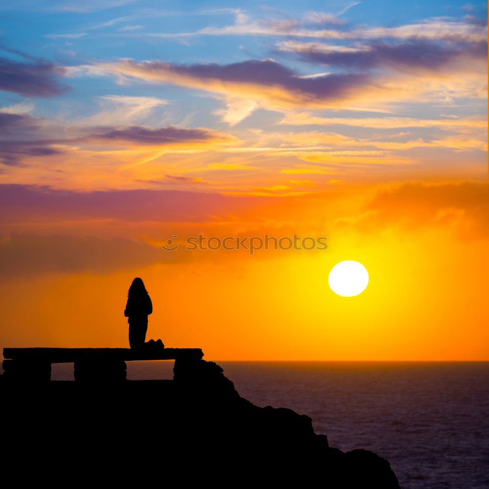 Similar – Silhouette at sunset Water