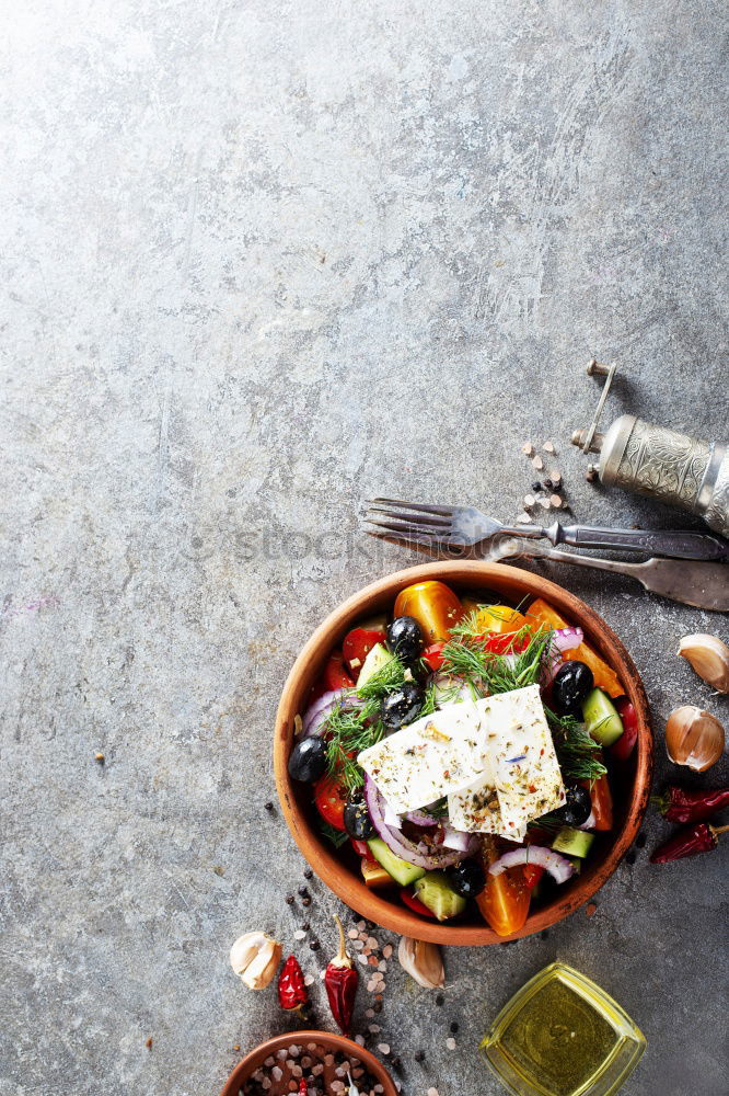 Similar – Salad with tomatoes, cucumber, onion and caramelized nuts