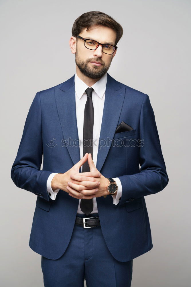 Similar – Image, Stock Photo Young stylish man at white wall