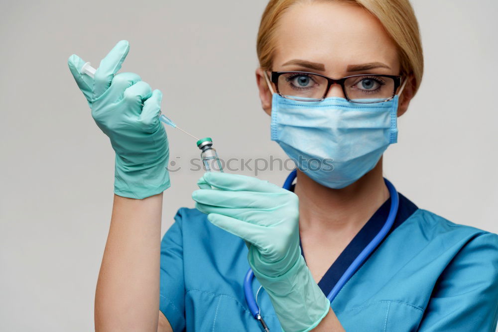 Similar – Image, Stock Photo Female doctor putting on her protective gloves