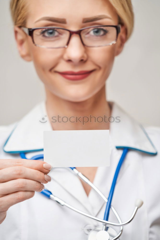 Similar – Female doctor with stethoscope and lab coat