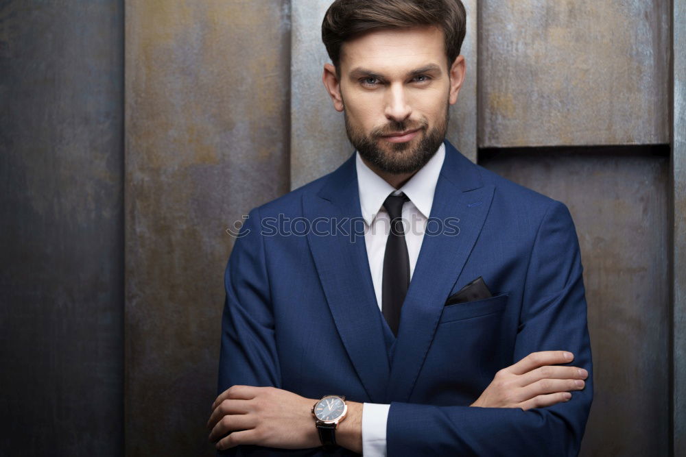 Similar – Image, Stock Photo Portrait of a stylish young handsome long-haired unshaven man