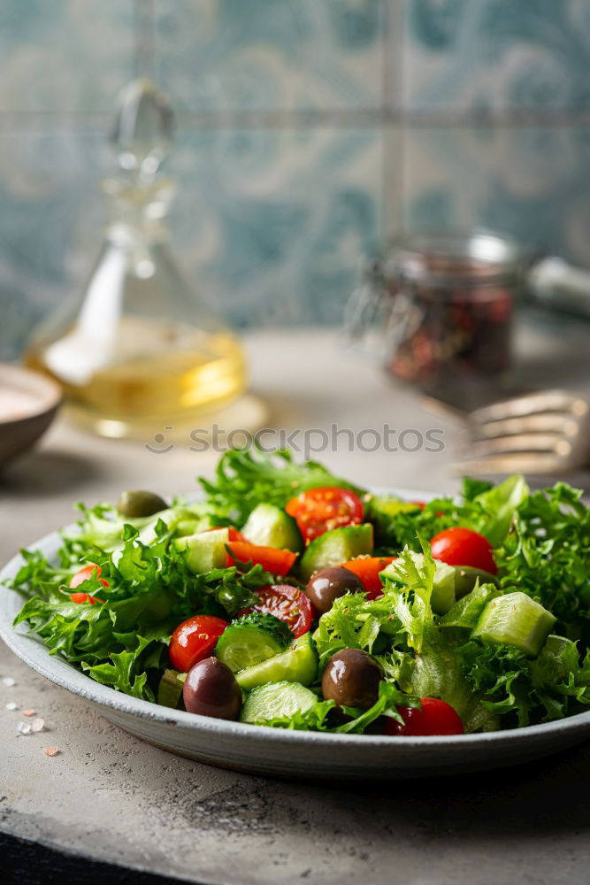 Similar – fresh salad on dark wooden table