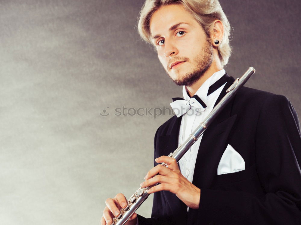 Similar – Image, Stock Photo young man with beard, bow tie and suit