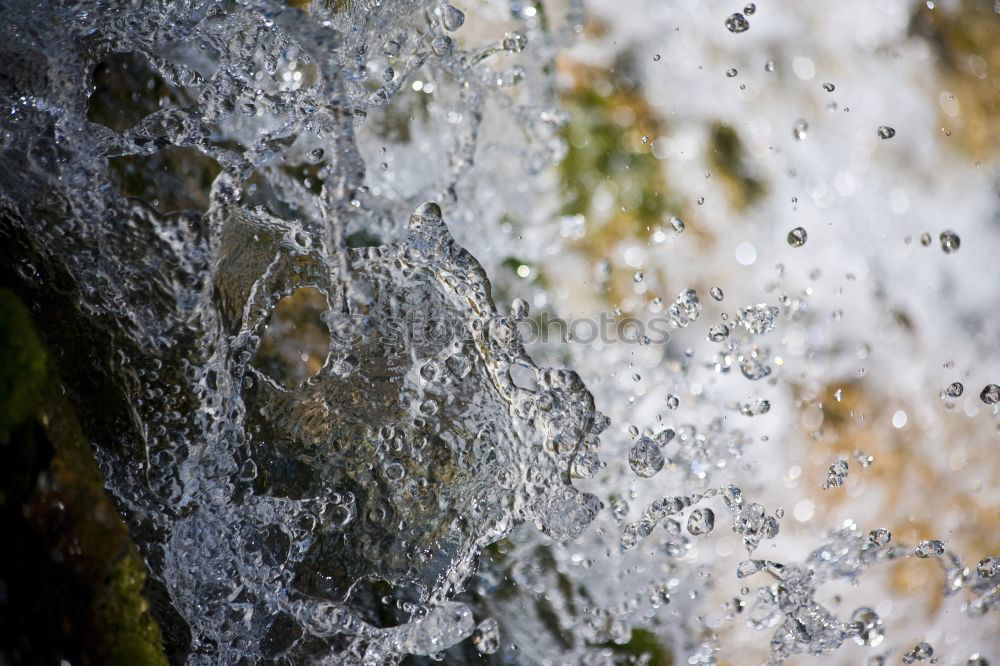 Similar – Wasserspiel Wassertropfen