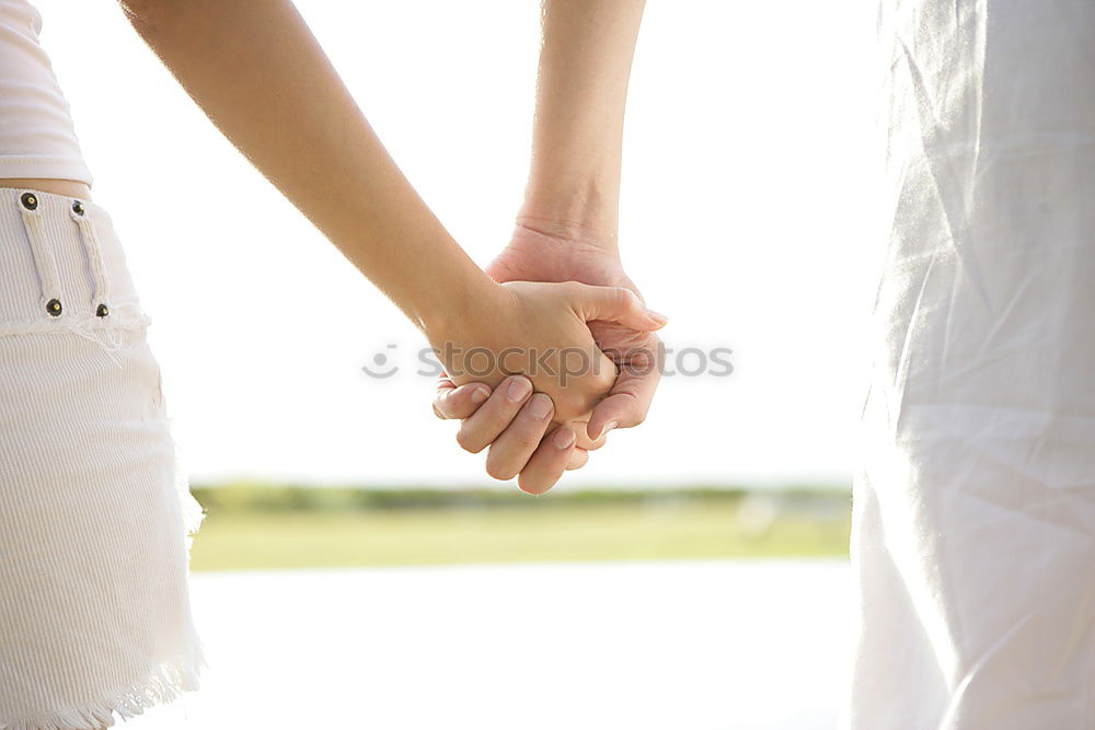 Similar – Two young women in walking holding her hands