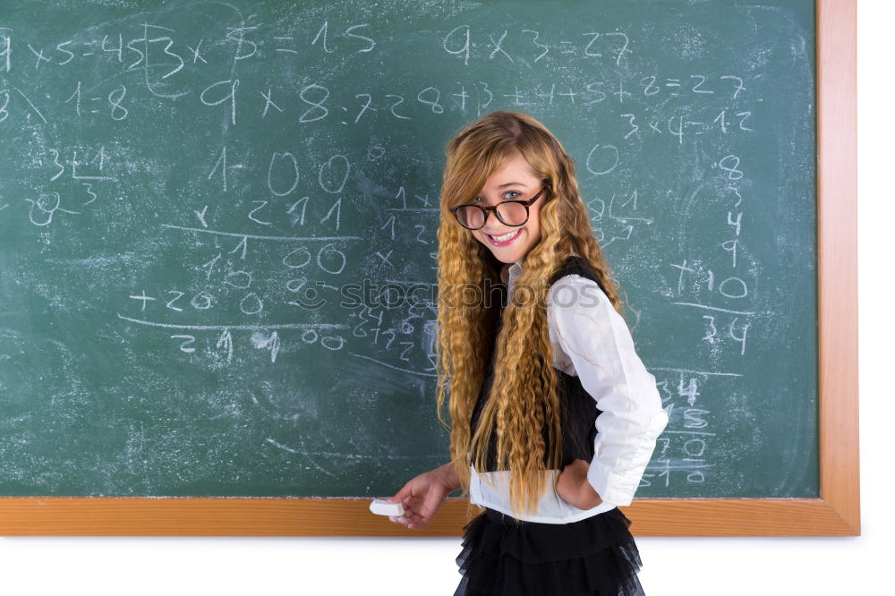 Similar – Pupil writing on the blackboard