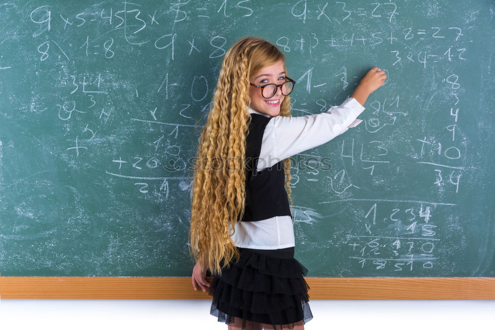 Similar – Pupil writing on the blackboard