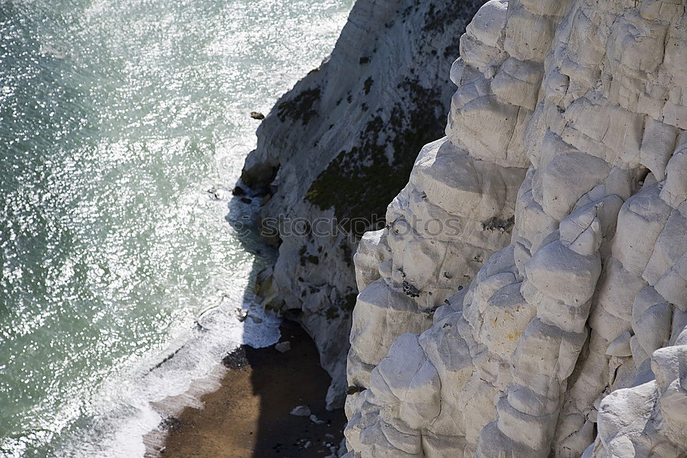 White rock, black sand