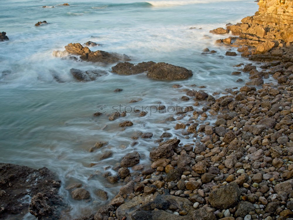 Similar – Stones as breakwaters