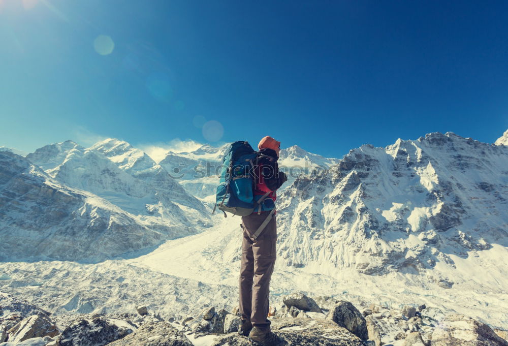 Similar – Woman tourist in mountains