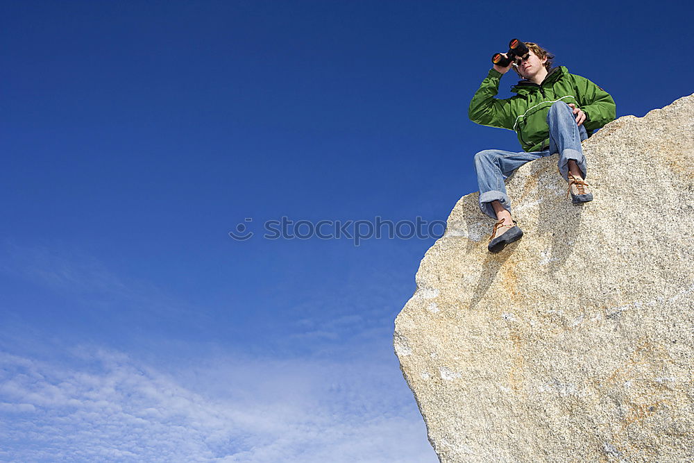 Similar – Climber and his camp dangling from a cliff.